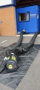 Portable inflatable workspace with its air supply hose
